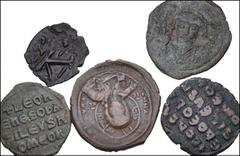 BYZANTINE. Lot of four (4) bronzes. Includes: Maurice Tiberius. Æ Follis // Justinian II. Æ Half Follis // Leo VI. Æ Follis // Anonymous Class B Æ Follis // Lot also includes one (1) modern cast copy 