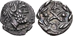 ACHAIA, Achaian League. Lakedaimon (Sparta). Circa 85 BC. AR Hemidrachm (15mm, 2.32 g, 8h). Laureate head of Zeus right / Achaian League monogram; monogram above, piloi of the Dioskouroi flanking, ΠY 