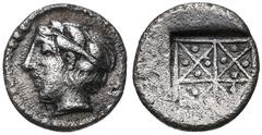 Greek MACEDON, Chalkidian League. Circa 425-390 BC. AR Obol (7mm, 0.26 g). Reduced standard. Olynthos mint. Laureate head of Apollo left / Quadripartite incuse square, each quadrant diagonally divided
