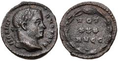 Roman Imperial Galerius. AD 305-311. Æ 1/8 Follis (13mm, 1.39 g, 5h). Treveri (Trier) mint. Struck circa summer AD 307. MAXIMI ANVS AVG, laureate head right / VOT/ XXX/ AVGG in three lines within wrea