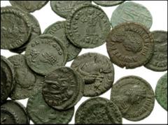 ROMAN IMPERIAL. Family of Theodosius I. Lot of twenty-two small Æ. Lot includes mostly Valentinian II and Theodosius II, but Arcadius and Honorius can also be found. Coins average Fine-VF. Twenty-two 