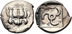 Greek DYNASTS of LYCIA. Mithrapata. Circa 390-370 BC. AR Sixth Stater (13mm, 1.46 g). Phellos(?) mint. Facing lion scalp / Triskeles; dolphin in one section; all within incuse square. Müseler VII 76–7