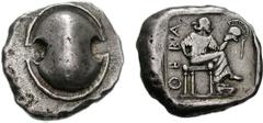 BOIOTIA, Thebes. Circa 450-440 BC. AR Stater (12.18 g). Boiotian shield / Female figure (Harmonia?), wearing long chiton, seated right, holding crested Corinthian helmet in her left hand, right hand o