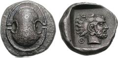 BOIOTIA, Thebes. Circa 440-425 BC. AR Stater (11.63 g). Boiotian shield / Bearded head of Herakles right, wearing lion's skin headdress, the mane windswept to rear; Q-[E] across lower field; all withi
