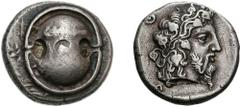 BOIOTIA, Thebes. Circa 425-395 BC. AR Stater (12.13 g). Later style. Boiotian shield, club across upper half / Bearded head of Dionysos right, wearing ivy wreath; [Q]-E downward on left; all within co
