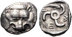 Greek DYNASTS of LYCIA. Mithrapata. Circa 390-370 BC. AR Sixth Stater (13mm, 1.50 g). Phellos(?) mint. Facing lion scalp / Triskeles; dolphin in one section; all within incuse square. Müseler VII 76–7