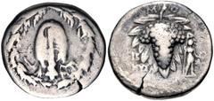 Greek LYDIA, Nysa. Circa 85/4-62/1 BC. AR Didrachm (19mm, 5.91 g, 12h). Cistophoric standard. Dated CY 12 (circa 74/3 BC). Lion's skin draped over club; all within wreath / Grape bunch on vine; M-O ab