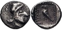 Greek UNCERTAIN EAST. Late 5th-4th centuries BC. AR Tetartemorion (6mm, 0.19 g, 12h). Head right, wearing bashlyk(?) / Owl standing left, head facing; IMAN in retrograde Greek to left; all in dotted s