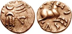 CELTIC, Britain. Trinovantes & Catuvellauni. Tasciovanus. Circa 25-10 BC. AV Quarter Stater (1.32 g). First coinage, circa 25-20 BC. Crossed wreaths; two crescents at center, pellets-in-annulets at en