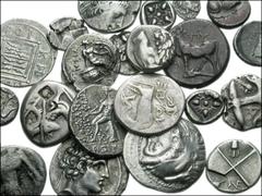 Lot of twenty-four Greek AR fractions. Lucania. Thourioi. Circa 400-350 BC. AR Triobol ( 0.92 g). Helmeted head of Athena right; laurel-wreath on helmet / Bull butting right; uncertain symbol in exerg