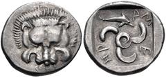 Greek DYNASTS of LYCIA. Mithrapata. Circa 390-370 BC. AR Sixth Stater (13mm, 1.52 g). Phellos(?) mint. Facing lion scalp / Triskeles; dolphin in one section; all within incuse square. Müseler VII 76–7