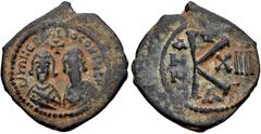 Byzantine Revolt of the Heraclii. 608-610. Æ Half Follis – 20 Nummi (28.8mm, 6.77 g, 12h). Alexandria mint, 1st officina. Dated IY 14 (610). Facing busts of Heraclius, on left, and his father, the exa