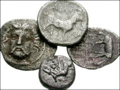 Lot of four Greek AR Fractions of northern Greece. Thrace, Ainos. AR Obol. Facing head of Hermes / Goat right. SNG Copenhagen 416 // Thraco-Macedonian. AR Obol(?). Forepart of lion / Facing Gorgoneion
