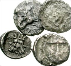 Lot of four Greek AR Fractions from Samaria. AR Obol. Lion bringing down prey / Facing head of Athena. M&Q 102 // AR Obol. Ba’al standing / Facing female head. M&Q 117 // AR Hemiobol. Ba’al standing /