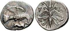 ELIS, Olympia. 134th-143rd Olympiad. Circa 244-208 BC. AR Drachm (4.86 g, 6h). Eagle flying right, holding hare in its talons / Winged thunderbolt, gorgoneion in center; monogram to lower left, hippoc