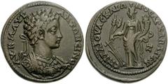 LYDIA, Bagis. Caracalla. AD 198-217. Æ 27mm (13.03 g). Gaios Asklionos, magistrate. Laureate and cuirassed bust right, slight drapery on far shoulder / Tyche of Bagis standing left, holding two grain-
