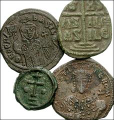 BYZANTINE. Lot of four middle period Byzantine Æ. Theophilus. Æ Follis. Constantinople mint. SB 1667 // Basil I. Æ 18mm. Cherson mint. SB 1718 // Constantine VII. Æ Follis. Constantinople mint. SB 176