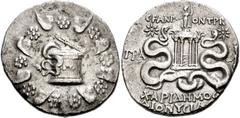 LYDIA, Tralleis. C. Fannius. Praetor, 49/8 BC. AR Tetradrachm (12.04 g). Cistophoric standard. Charidemos, son of Dionysides, magistrate. Cista mystica with serpent; all within ivy wreath / Hexastyle 