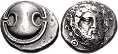 BOEOTIA, Thebes. Circa 405-395 BC. AR Stater (12.02 g). Boeotian shield / Facing head of bearded Dionysos facing slightly right, wearing ivy wreath; Q-E across lower field; all within concave incuse. 