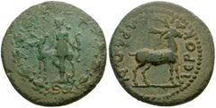 LYDIA, Hierocaesaraea. Circa 1st-2nd centuries AD. Æ 20mm (4.69 g). Artemis standing left, resting hand on neck of stag standing before her, and holding bow; all within laurel wreath with berries / IE
