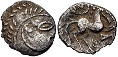 British CELTIC, Iceni. Uninscribed. Circa 65-1 BC. AR Unit (12mm, 1.05 g, 7h). Early Face/Horse type (Irstead A). Struck circa 50-30 BC. Celticized male head right / Horse right; above, wheel; pellet-