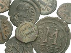 BYZANTINE. Early. Lot of nine Æ of Justinian I and Maurice Tiberius. Justinian I. Decanummium. Constantinople mint. RY 19. DOC I -; SB 167 // Constantinople mint. RY 28. DOC I 87; SB 167 // Half Folli