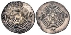 Early Medieval & Islamic ISLAMIC, Umayyad Caliphate. 'Atiya ibn al-Aswad. Kharijite rebel, AH 71-76 / AD 690-696. AR Drachm (30mm, 3.57 g, 3h). Arab-Sasanian type. KRMAN-NAR mint. Dated AH 75 in Pahla