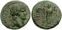 LYDIA, Hypaepa. Nero. AD 54-68. Æ 18mm (5.59 g). Laureate head right / Dionysos standing left, holding kantharos and thyrsos. RPC I 2550-1 var.. VF, rough green patina. The difference in RPC numbers i