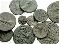 MIXED. Greek to Roman Imperial. Miscellaneous AR and Æ. Includes: GREEK: MYSIA, Priapos. Æ 12mm. Apollo / Crab // IONIA, Kolophon. Æ 20mm. Homer / Apollo Kitharoidos // Magnesia. Æ 15mm. Zeus / Tripod