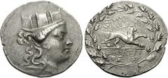 IONIA, Smyrna. Circa 105-95 BC. AR Tetradrachm (15.88 g, 12h). Demetrios, magistrate. Turreted head of Tyche right / ZMUR/NAIWN, Lion right; below, DHMHTRI/OS in two lines and monogram; all within wre