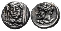 Greek CILICIA, Uncertain. 4th century BC. AR Hemiobol (7mm, 0.30 g, 9h). Veiled and draped bust of female facing slightly left, wearing earrings and necklace / Bearded head of Herakles left, lion skin