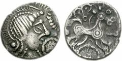 CELTIC, Britain. Atrebates & Regni. Uninscribed. Circa 75-45 BC. AR Unit (1.18 g, 11h). Struck circa 50-30 BC. Helmeted head right / Horse prancing right; wheel below, ornaments around. Bean QsD3-1; V