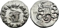 LYDIA, Tralleis. Circa 166-67 BC. AR Tetradrachm (12.65 g, 12h). Dion, magistrate. Undated issue, struck circa 100-90 BC. Cista mystica with serpent; all within ivy wreath / Bow case with serpents; ΔI