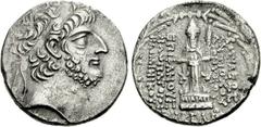SELEUKID KINGS of SYRIA. Antiochos XII Dionysos. 87/6-84/3 BC. AR Tetradrachm (15.69 g, 12h). Damaskos mint. Dated SE 230 (83/2 BC). Diademed head right / Cult statue of Hadad standing facing on doubl
