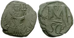 Heraclius. 610-641. Æ Follis (29mm, 13.39 g, 6h). Sicilian mint. Countermarked on a follis of Justinian I, Constantinople mint. Crowned and draped facing bust of Heraclius; monogram to right; all with
