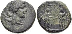 LYDIA, Magnesia ad Sipylum. 2nd-1st centuries BC. Æ 15mm (4.24 g, 12h). Head of Artemis right, wearing stephane, bow and quiver over shoulder / Two male figures (Zeus and Hermes?) standing vis-à-vis, 
