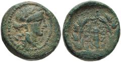 LYDIA, Sardes. Circa 133 BC-AD 14. Æ 15mm (4.35 g, 2h). Laureate head of Apollo right / Club within laurel wreath; monogram above. SNG Copenhagen 470-482 var. (monogram). VF, green patina, light earth