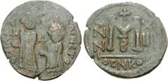 SASANIAN KINGS. temp. Khosrau II. AD 591-628. Æ Follis (9.03 g, 9h). Imitating a Byzantine follis of Heraclius with Heraclius Constantine from Nicomedia mint, dated RY 13 (621/2). Uncertain Syrian min