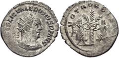 Valerian I. AD 253-260. AR Antoninianus (22mm, 3.69 g, 12h). Samosata mint. 1st emission, AD 255-256. Radiate, draped, and cuirassed bust right / Two Victories standing attaching shield inscribed S C 