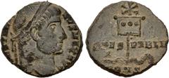 Roman Imperial Constantine I. AD 307/310-337. Æ Follis (17mm, 1.60 g, 12h). Constantinople mint, 1st officina. Struck AD 327. Laureate head right / Labarum, with three medallions on drapery and surmou