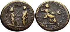 LYDIA, Sardis. Tiberius. AD 14-37. Æ 18mm (4.34 g, 12h). Julius Kleon and Memnon, magistrates. Tiberius standing left, raising up kneeling Tyche of Sardis / Livia seated right, holding scepter and gra