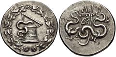 LYDIA, Tralleis. Circa 166-67 BC. AR Tetradrachm (27mm, 12.61 g, 12h). Cistophoric type. Struck circa 140-135 BC. Cista mystica with serpent; all within ivy wreath / Two serpents entwined around bow a