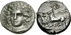 SICILY, Katane. Circa 405-403/2 BC. AR Tetradrachm (16.92 g, 3h). Obverse die signed by Herakleidas. Head of Apollo facing slightly left, wearing laurel wreath; [HPAKΛEIΔAΣ to right] / Charioteer, hol
