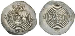Arab-Sasanian and other Pre-reform issues Pre-reform issues, Arab-Sasanian. In the name of Khusraw II. AR Drachm (34.5mm, 4.09 g, 9h). ŠY (uncertain location). Dated AH 33 (AD 654). Obverse: name of K