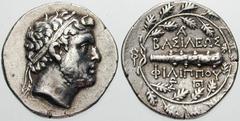 Estimate $750 MACEDON, Kings of. Philip V. 221-179 BC. AR Didrachm (8.43 gm). Struck 186-182 BC. Diademed head right / Club within wreath, one monogram above, two monograms below; caduceus to left. Cf