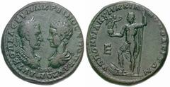 Estimate $150 MOESIA INFERIOR, Marcianopolis. Macrinus and Diadumenian. 217-218 AD. Æ 26m (11.00 gm). Confronted heads of Macrinus and Diadumenian / Macrinus standing left, holding Nike on globe and r