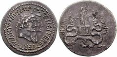 Estimate $2500 MARK ANTONY & OCTAVIA. 39 BC. AR Cistophoric Tetradrachm (11.25 gm). Ephesus mint. Conjoined busts of Antony and Octavia right / Dionysus standing left on cista between twisting snakes.