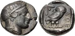 Greek ATTICA, Athens. Circa 454-404 BC. AR Tetradrachm (24mm, 17.13 g, 10h). Helmeted head of Athena right, with frontal eye / Owl standing right, head facing, closed tail feathers; olive spray and cr