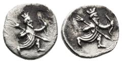 Greek PERSIA, (Silver. 0,66g. 11mm) Persian king or hero, wearing kidaris and kandys, in kneeling-running stance right, holding spear in right hand, bow in left Rev: Persian king or hero, wearing kida