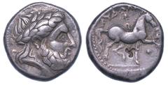 MONETE GRECHE IMITAZIONI CELTICHE DEL DANUBIO., Tetradracma, III-II sec. a.C. Testa di Giove a d. R/ Guerriero a cavallo a d. Molto rara. g. 13,24. Diam. mm. 24,12. Arg. Triskelion in contromarca al r